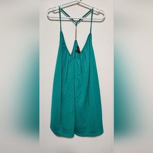 Green camisole.  Top looks teal but is jade in person with gold hardware